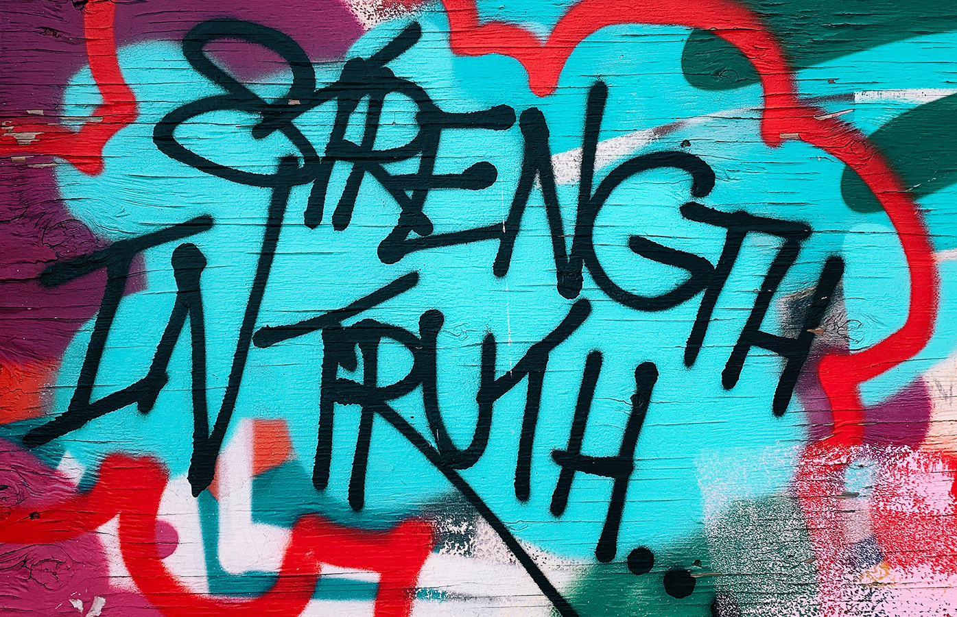 Colourful graffiti reading strength in truth